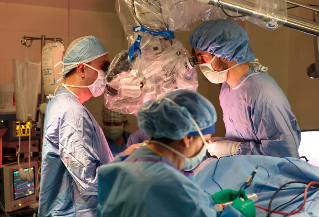 Dr. Tim Bentley pictured performing surgery