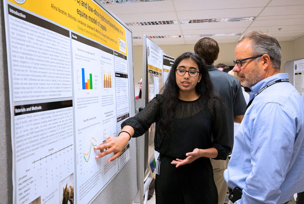 Summer Research Program participant pictured with Dr. Couetil