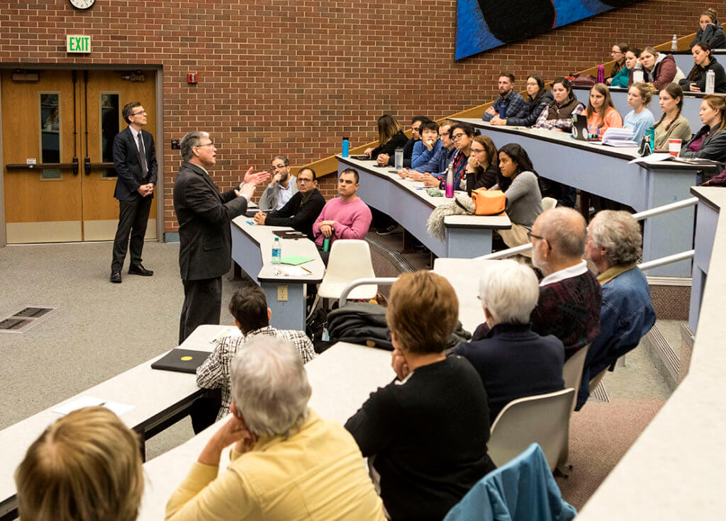 Dr. Jeff Bender answers questions in Lynn 1136 during the 2018 Coppoc One Health Lecture, which attracted a capacity crowd. Associate Dean for Research Harm HogenEsch (in background) introduced Dr. Bender and moderated the question and answer session.