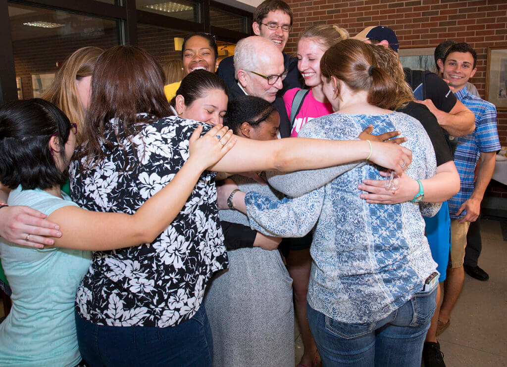 Dr. Hullinger pictured with students