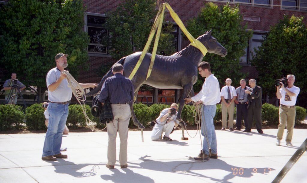 Larry Anderson pictured supervising the installation of the Continuum sculpture at Purdue