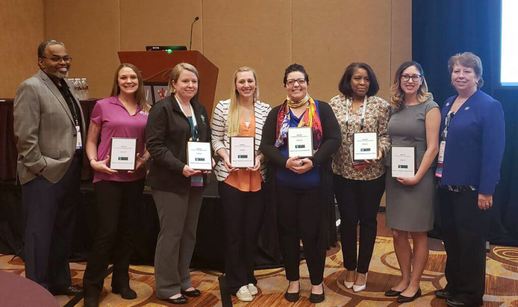 Jessica Bowditch pictured with veterinary technicians at the WVC Conference