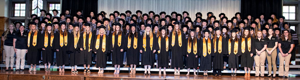 The PVM Class of 2019 stands together on the stage in the PMU ballroom