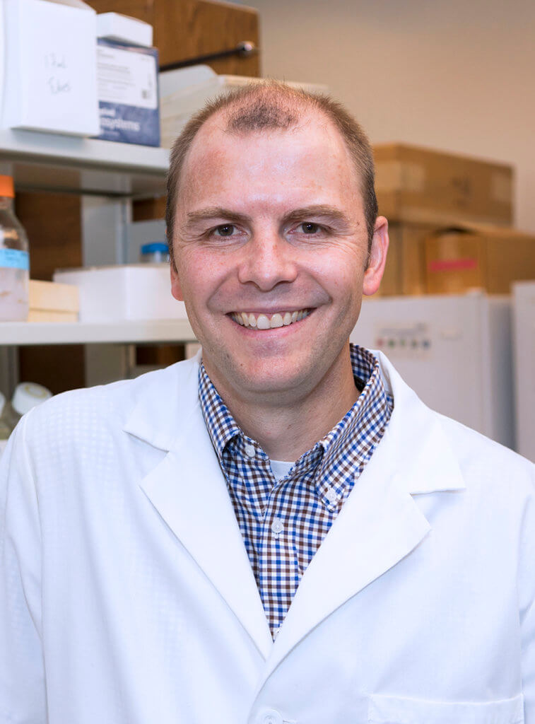 portrait of Dr. Main in his lab