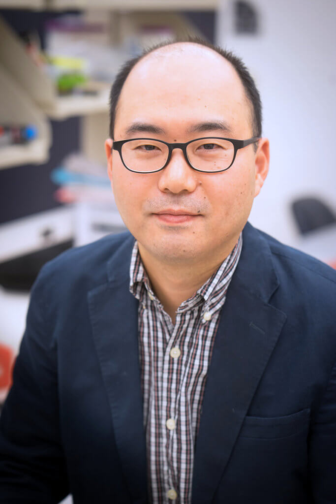 portrait of Dr. Kim in a lab