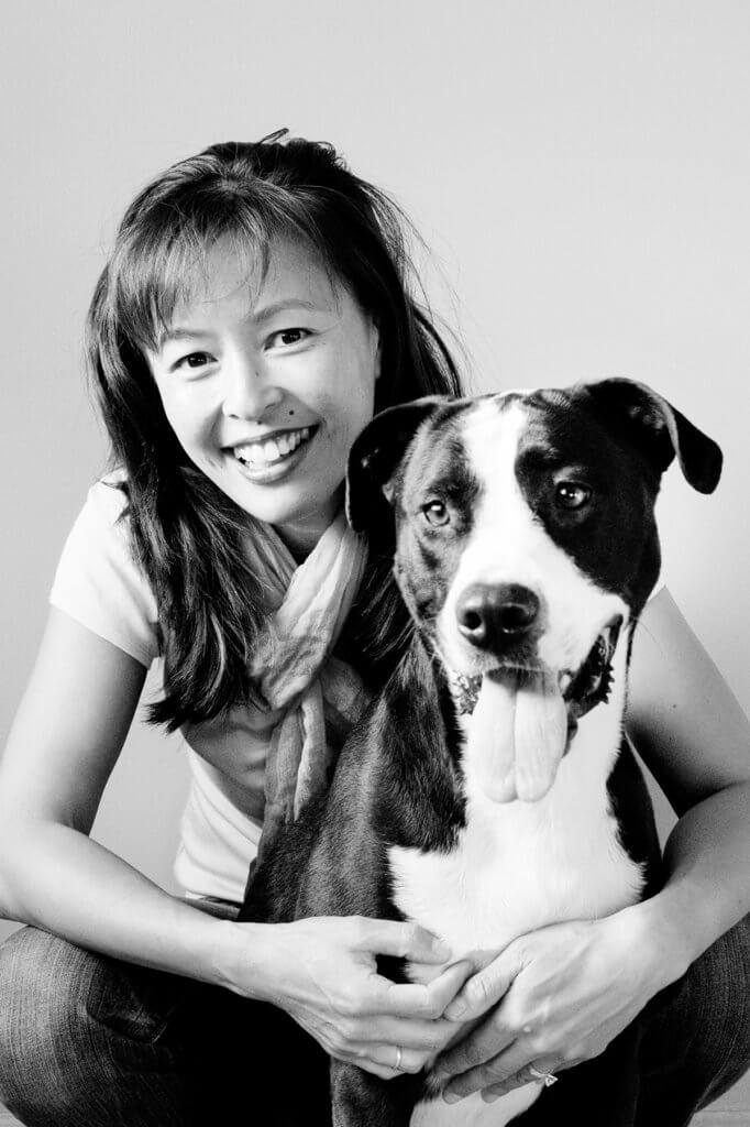 Justine Lee pictured holding her dog