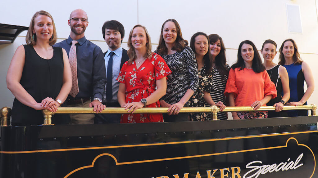 Graduating residents hop aboard a replica of the Boilermaker Special in DAUCH