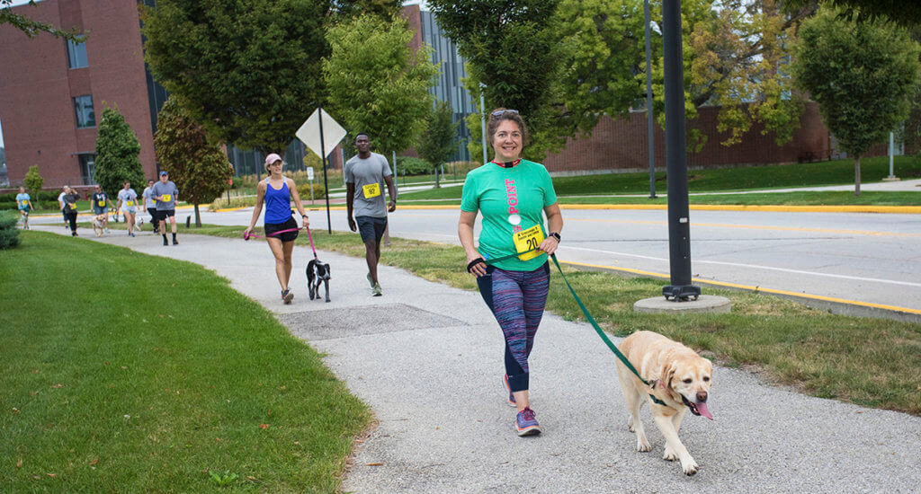 Dr. Skip Jackson Dog Jog participants enjoy their 5K trek through the Purdue campus.