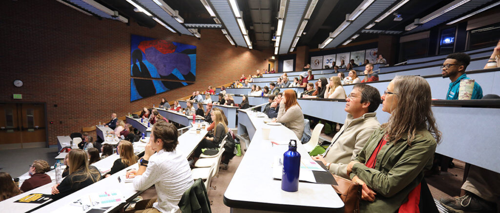 Attendees listen attentively in Lynn Hall Room 1136