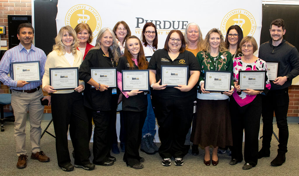 The group of Bravo Award recipients join together for a group photo