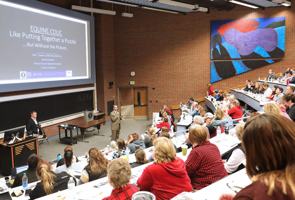 Dr. Lescun speaks to a full-house in the Lynn Hall lecture room.