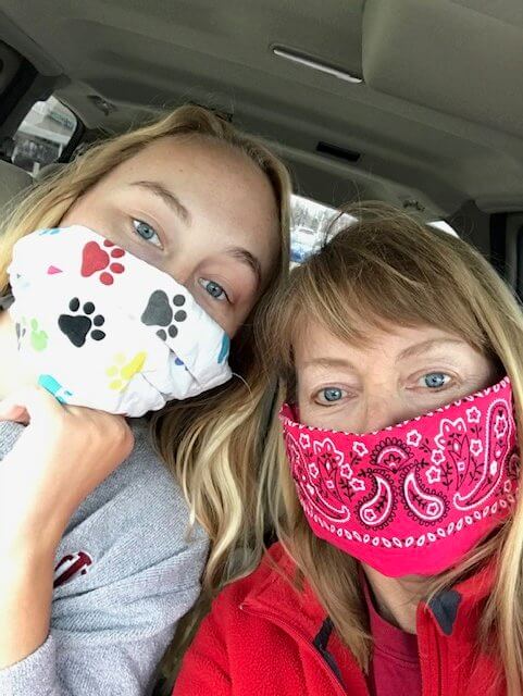 Mary Jayne and Claire take a selfie wearing facemasks