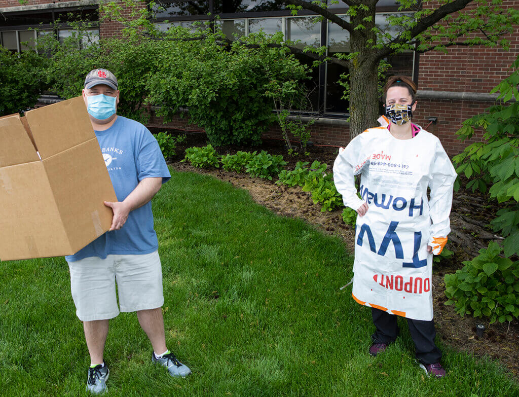 Nathan and Tami stand outside the Small Animal Hospital