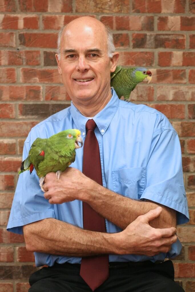 Dr. Donn Griffith and exotic birds portrait