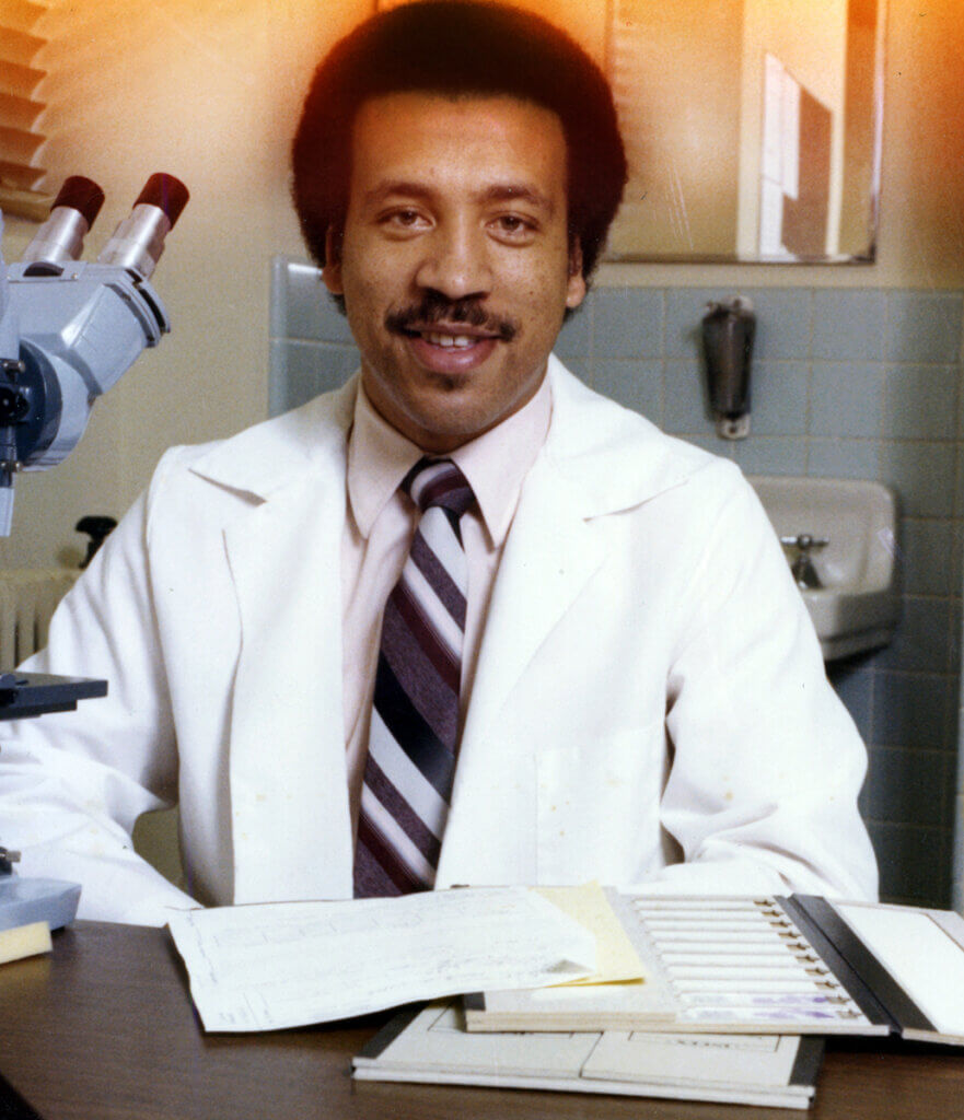 Dean Reed pictured working in a lab early in his career at Purdue