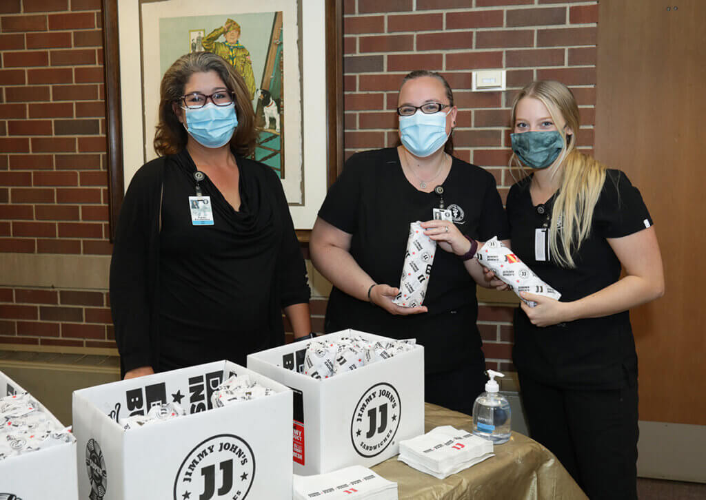 Susan is joined by veterinary nurses picking up sandwiches