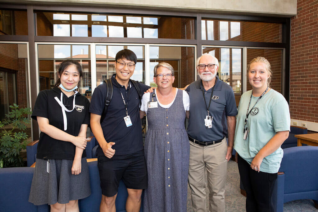 Lisa receives well-wishes from Dr. Paul Robinson, Distinguished Professor of Cytometry and director of the Purdue University Cytometry Laboratories, and members of his laboratory team.