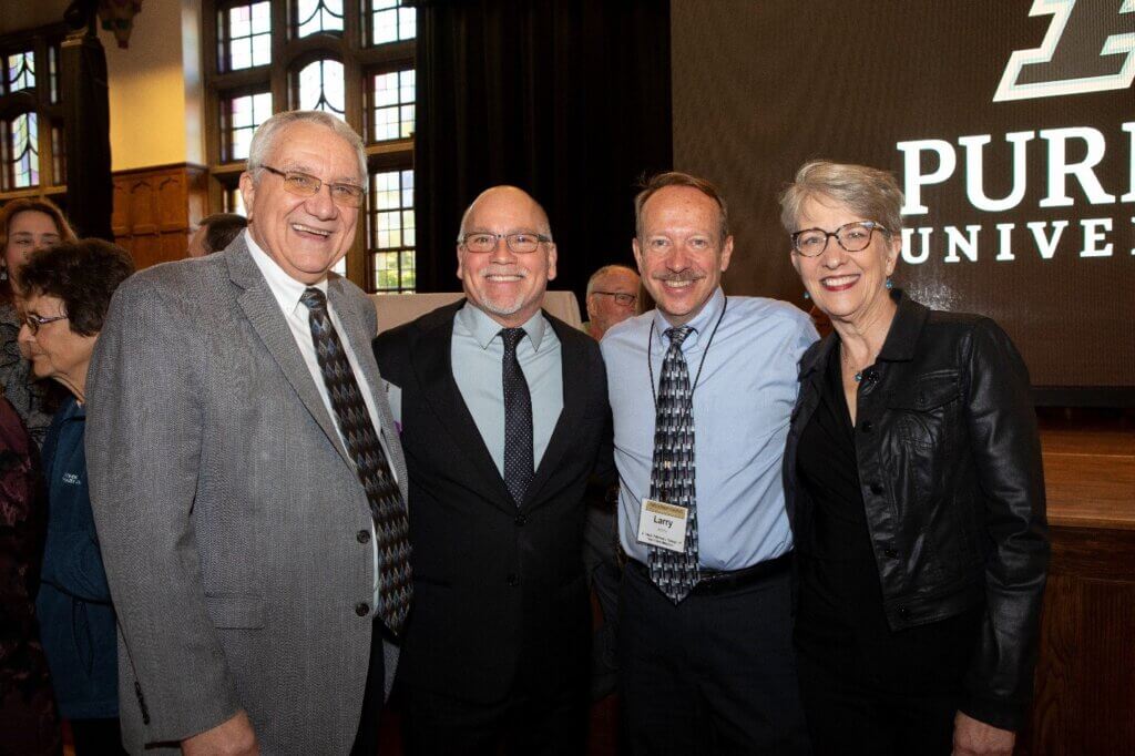 Pictured left-right: Dr. Dennis DeNicola (PU DVM ’78) with Distinguished Alumnus Award recipient Dr. Fred Metzger (PU DVM ’86), and Raymond E. Plue Outstanding Teacher Award winner Dr. Larry Adams and his wife, Dr. Laurie Adams.