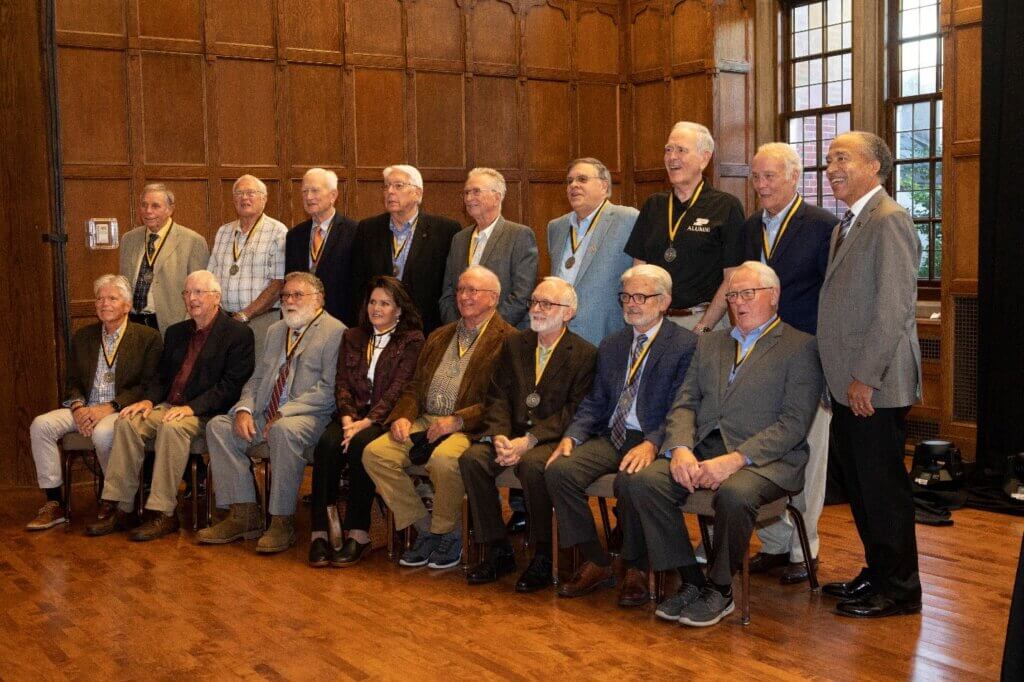 Dean Reed joins members of the DVM Class of ’72, the Silver Anniversary Class as they pose for a class picture at the conclusion of the Alumni and Friends Celebration in the Purdue Memorial Union North Ballroom.