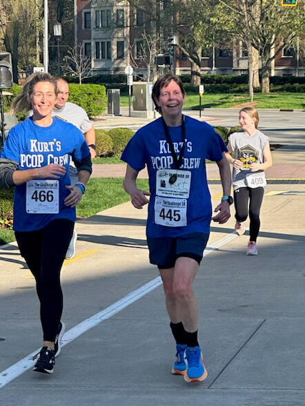 Sarah and Dr. Knapp run along the 5K course on Purdue's West Lafayette campus