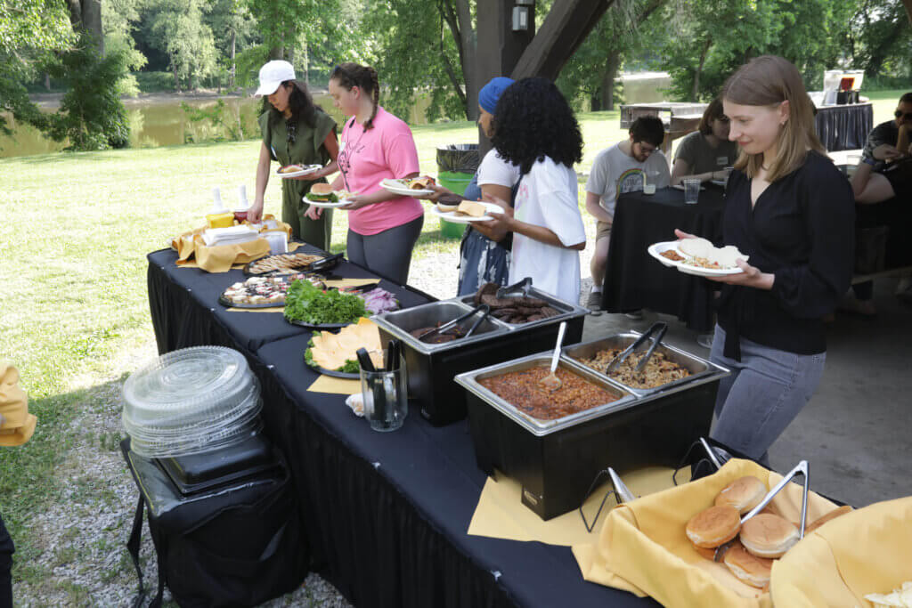 The Annual Veterinary Research Scholars Summer Program picnic featured the traditional menu of hamburgers and pork barbecue.