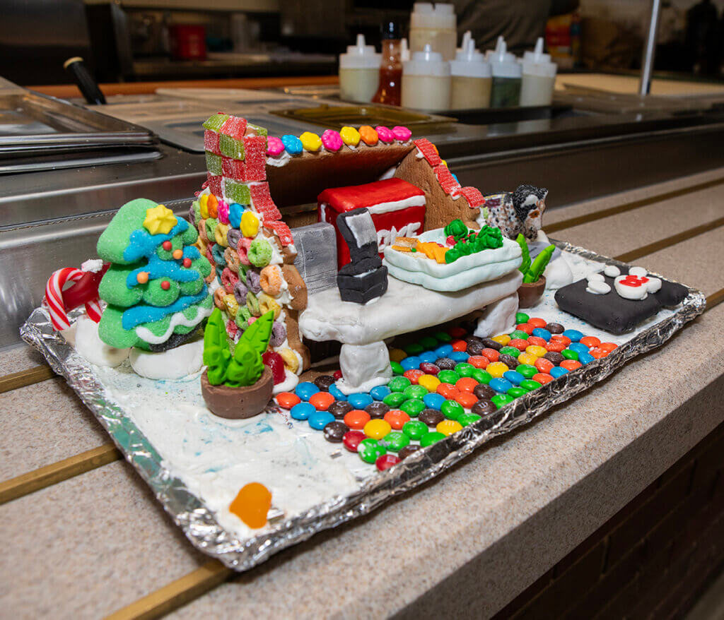The Continuum Café Gingerbread House displayed in the café