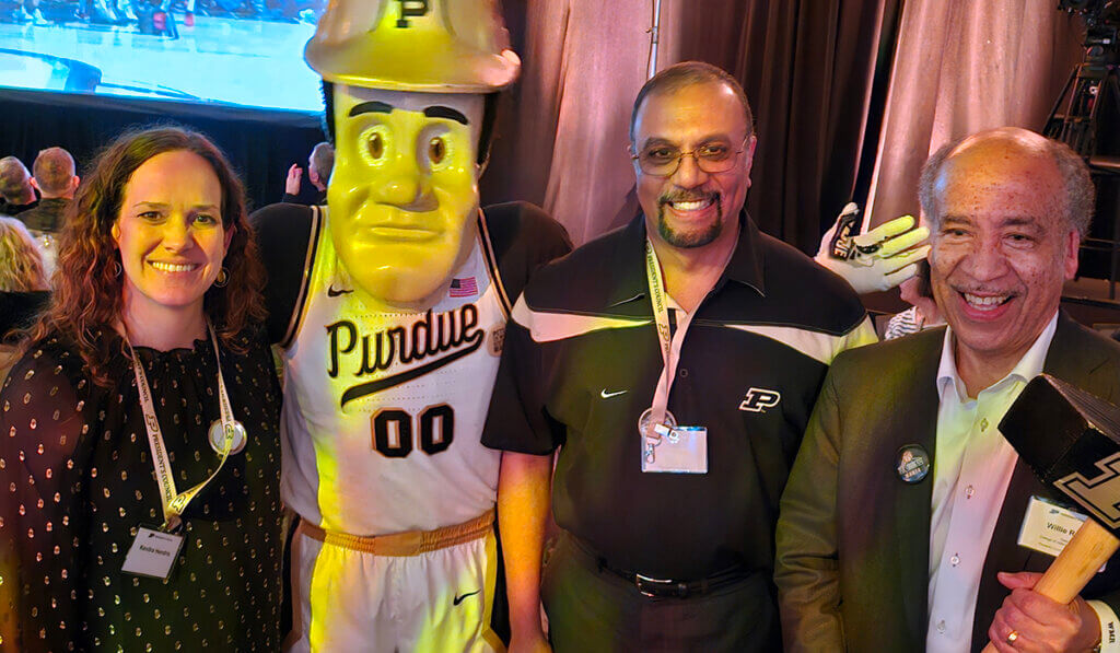 Dr. Hendrix, Purdue Pete, Dr. Narayanan, and Dean Reed join for a group photo at the event