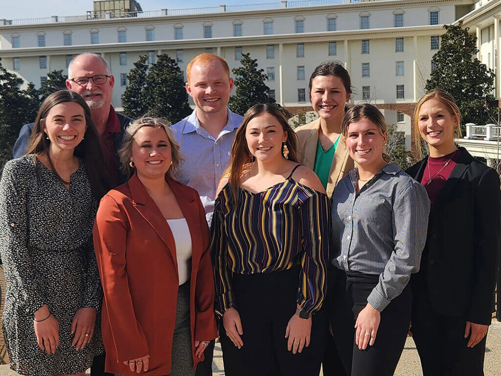 Kendall Sattler of the Purdue DVM Class of 2026 (front row, 4th from left) is pictured with other 2024 recipients of the AASV Foundation and Merck Animal Health Veterinary Student Scholarships and Dr. Jack Creel of Merck Animal Health (back row, far left).