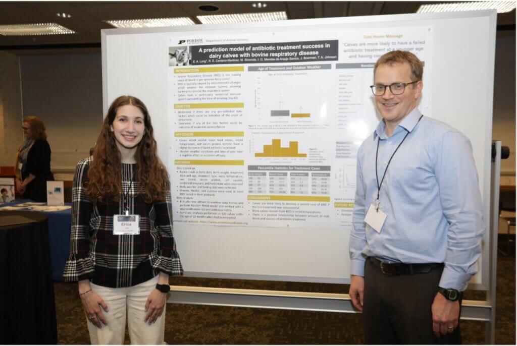 First place winner in the Undergraduate Division of the Research Poster Competition, Erica Long, with her mentor, Dr. Timothy Johnson, associate professor of animal sciences.