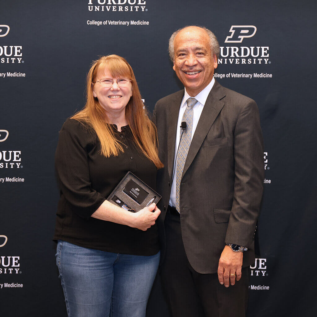 Lorraine Fox was recognized by Dean Willie Reed for 30 years of service to Purdue University at the PVM Staff Service Recognition Ceremony in December.