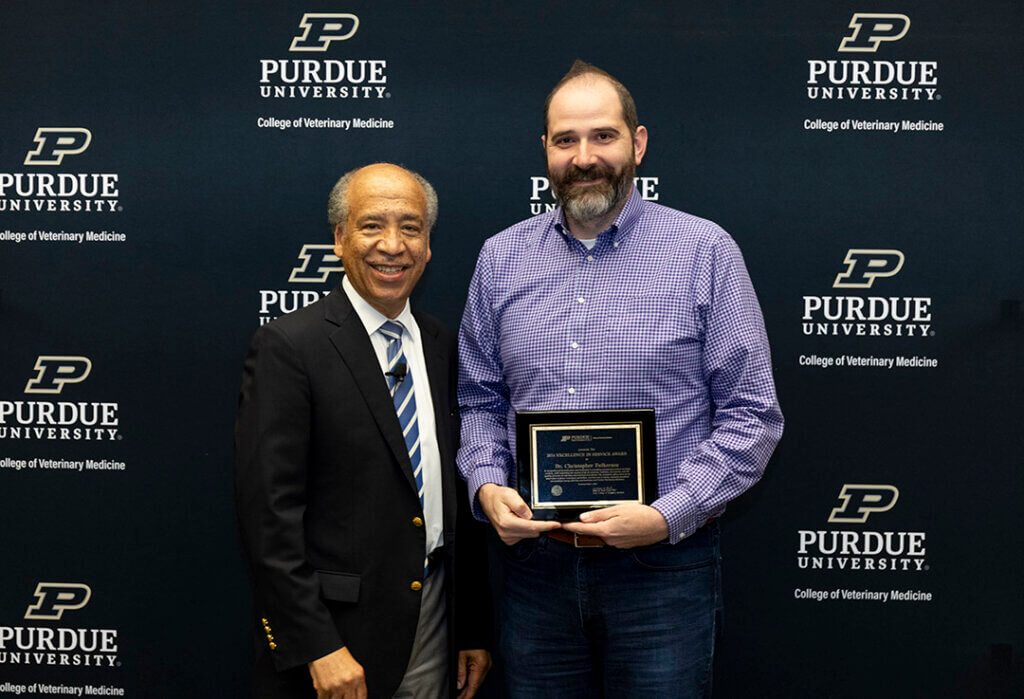 Dr. Chris Fulkerson, clinical associate professor of veterinary medical oncology, received the PVM Excellence in Service Award.