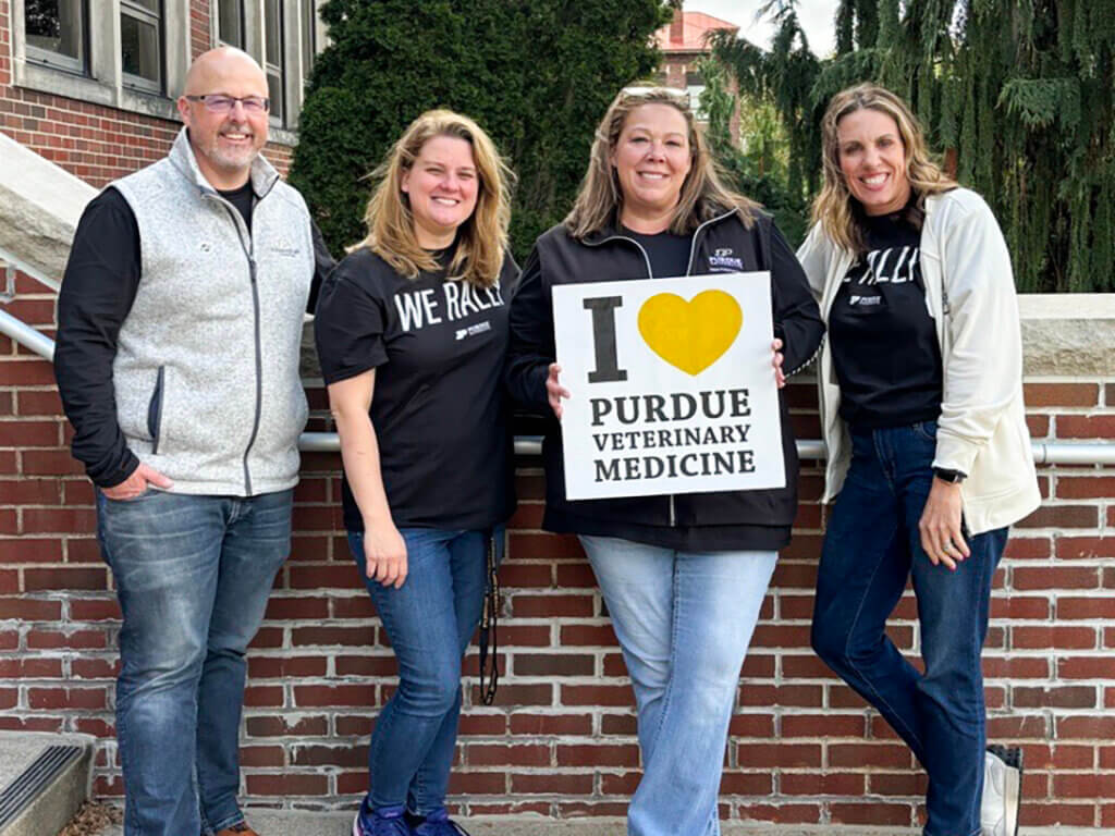 PVM Advancement Team members (left-right) Kyle Bymaster, Mackenzie Martin, Julie Bogan and April Shepherd pause for a PDoG photo op outside of Lynn Hall.