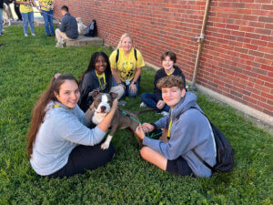 Senior Boiler Vet Campers enjoy time with their shelter dog that they “adopt” for the week.