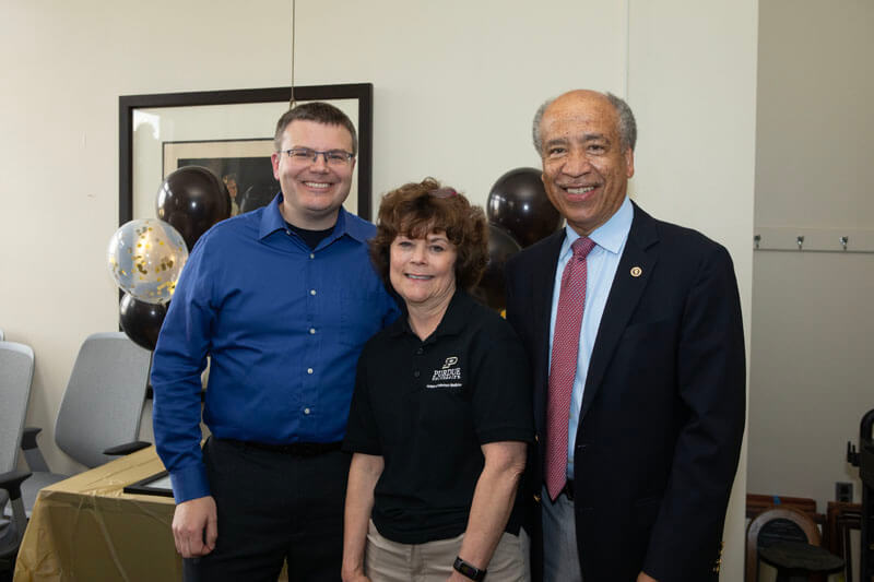 Nancy Allrich with Aaron Walz, senior director of Purdue IT Distributed Computing, and PVM Dean Willie Reed.