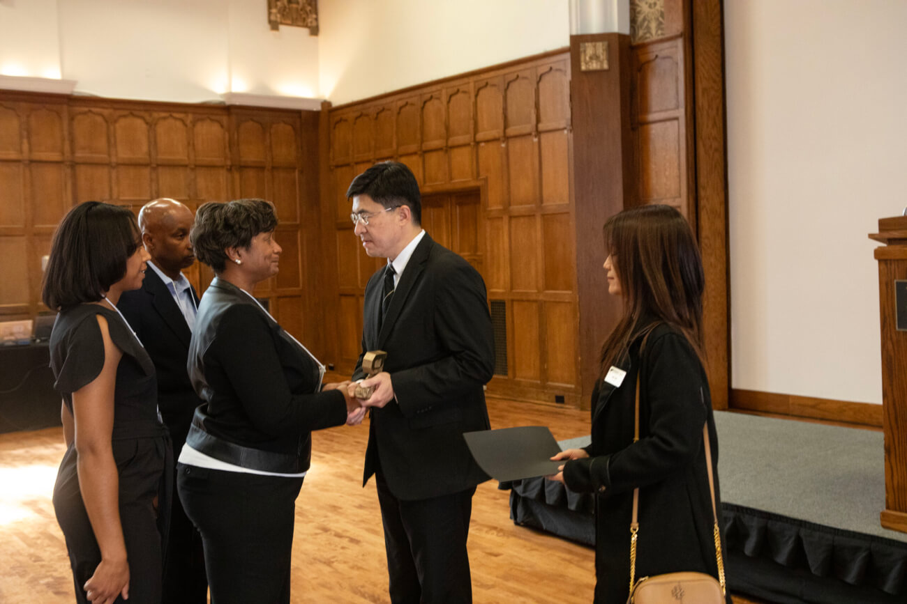 Arnetta and Patrick Lewis, with their daughter Jada, met Purdue President Mung Chiang and First Lady Kei Hui during the annual Golden Taps program Aprill 22, when veterinary student Aaron Lewis and 12 other Purdue students who passed away in the past year were remembered.