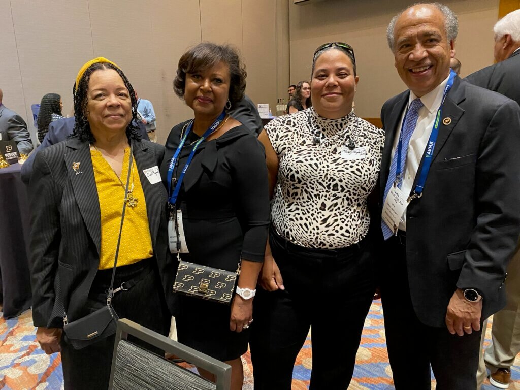 Dr. Doris Hughes-Moore (on left), with her daughter, Dr. Melanie Hughes (second from right), and Drs. Willie and Dorothy Reed at the Purdue Veterinary Alumni Reception held during the 2023 AVMA annual convention in Denver.