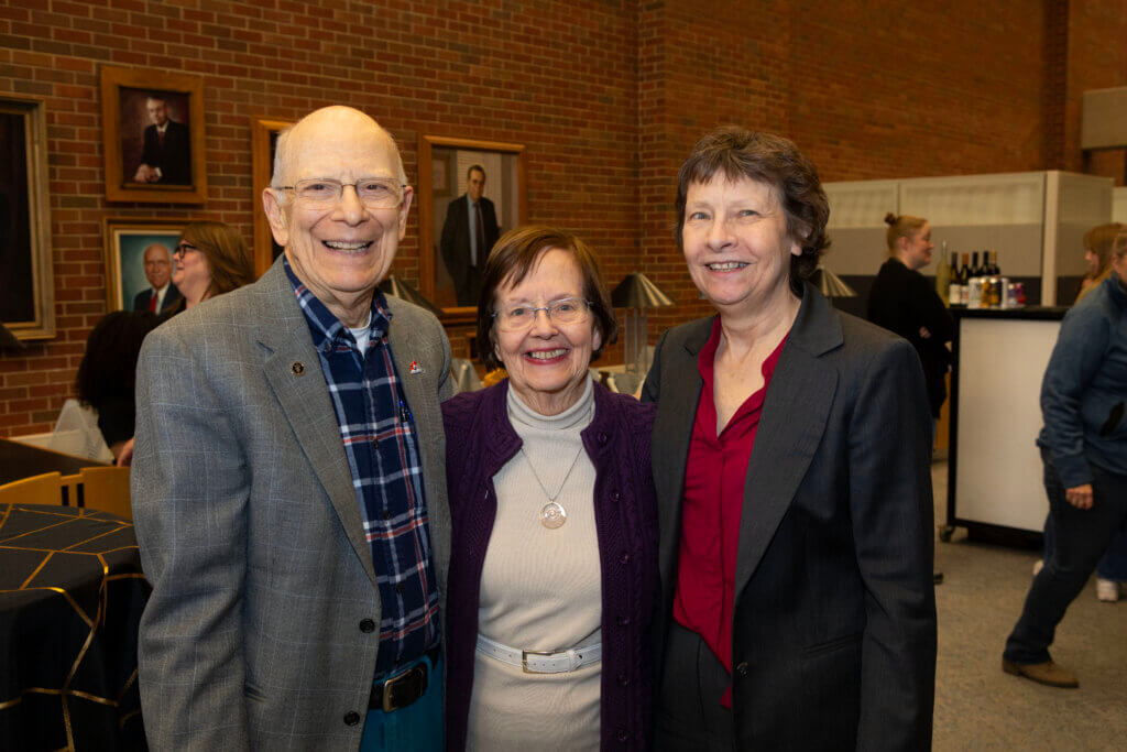 Dr. Jaeger with her predecessor as head of the Basic Medical Sciences Department, Dr. Gordon Coppoc, and his wife Harriet.