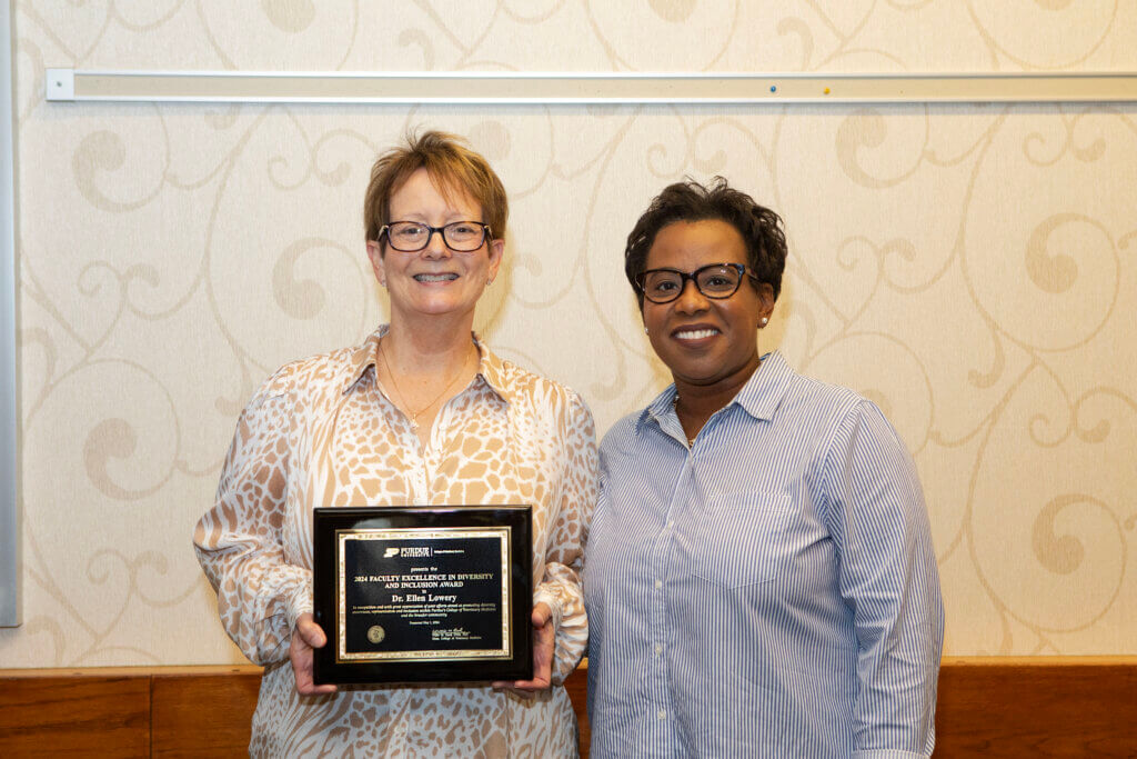 Dr. Ellen Lowery (left) with Marsha Baker who presented her with the 2024 Faculty Excellence in Diversity and Inclusion Award just before the Diversity Keynote at the Purdue Veterinary Conference in Stewart Center.