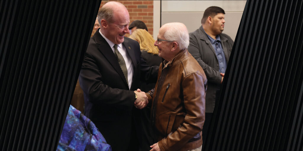 New PVM Dean Bret Marsh is greeted by one of his former teachers, Dr. Ronald Hullinger, Professor Emeritus of Basic Medical Sciences