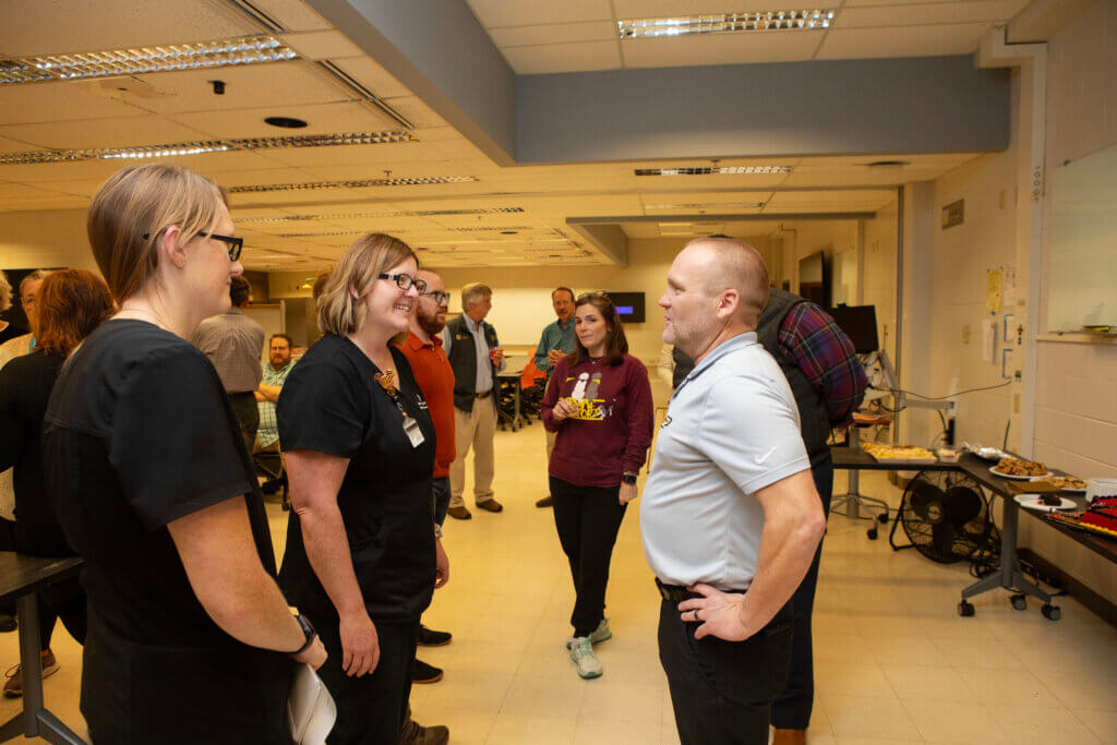 Dr. Chad Brown greets well-wishers at a reception held in his honor at Lynn Hall November 1.