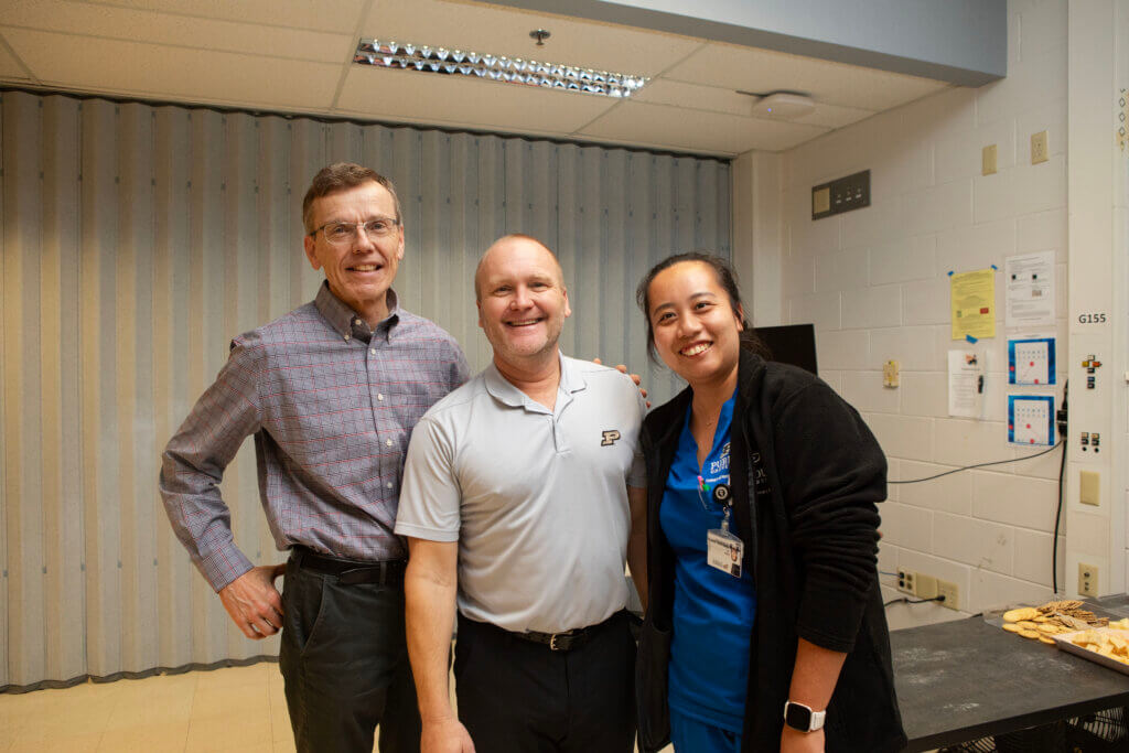 Among those who congratulated Dr. Brown at the reception were Dr. Harm HogenEsch, Distinguished Professor of Immunopathology, and veterinary student Joyce Jia of the Class of 2027.