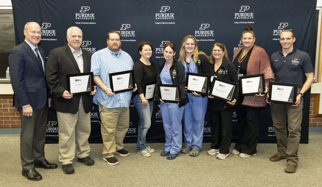 Dean Marsh with recipients of individual Bravo Awards (left to right) Brett Creech; Nathan Wilkes; Jaime Nichols; Lacie Plantenga; Chloe Morris, RVT; Kimberly Sederquist, RVT, VTS (Cardiology); Jennifer Danaher; and Scott Fix.