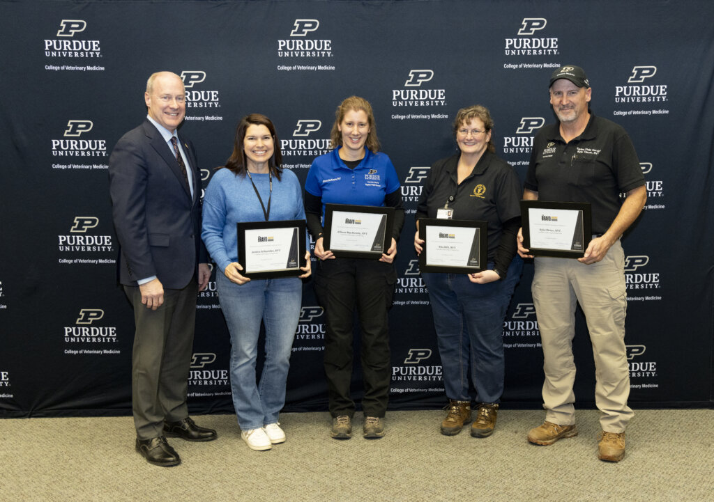 Dean Marsh and staff members who were present to receive a team Bravo Award for the large animal veterinary nursing and assistant team (left to right): Jessica Schneider, RVT (Swine Field Service); Allison MacKenzie, RVT (Equine Field Service); Rita Hilt, RVT (Bovine Field Service); and Kyle Clever, RVT (Equine Field Service)