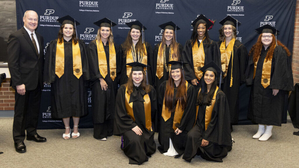 December Veterinary Nursing graduates join with Dean Bret Marsh for a photo after reciting their professional oath. (left to right, back row): Brenna Hipsher, Jordan Benningfield, Leslie Braunsdorf, Makenna Dunn, Te’Aira Johnson, Maya Koziol, and Amy Macauley; (left to right, front row): Abigail Ganske, Grace Jones, and Malissa Mahase.