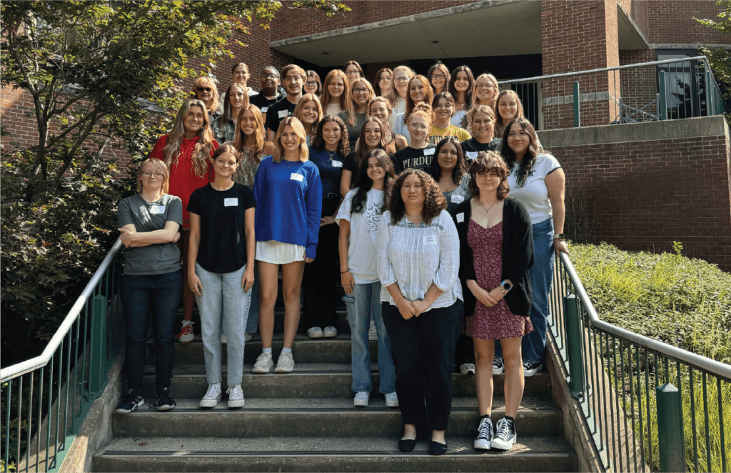 Students in the Veterinary Nursing Class of 2027 pause for a group photo during their orientation program designed to help prepare them for their first year of classes in Lynn Hall.