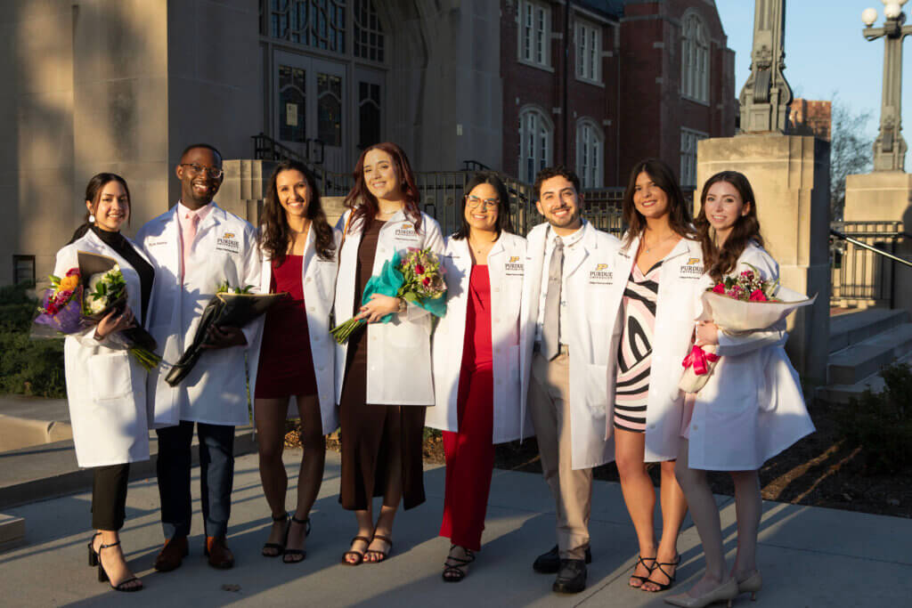 Students took advantage of the light from the setting sun for impromptu outdoor pictures.