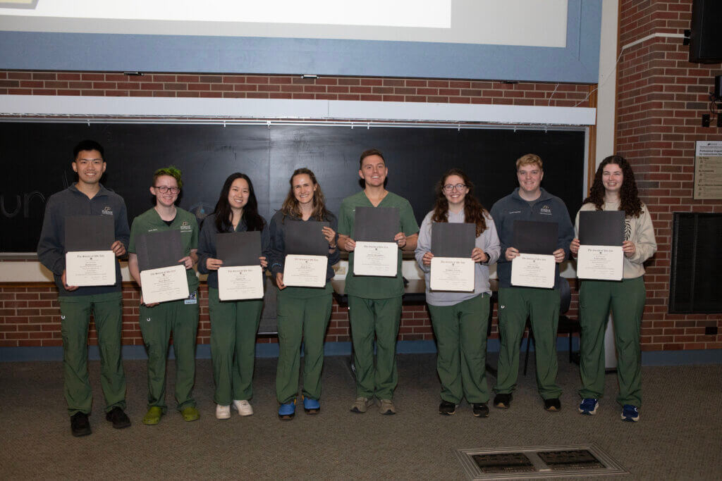 Third-year veterinary students who are in the top 10 percent of their class were recognized as new Phi Zeta initiates: (left-right) Jordan Chan, Keely Harris, Yonghua Hu, Paige Kinzie, Andrew Montgomery, Josaphine Roberts, Aaron Seymour and Kaitlyn Steele.