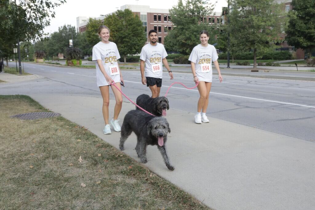 Participants in the Dr. Skip Jackson Dog Jog headed for the finish line at the conclusion of the Purdue Veterinary Conference week on Saturday, September 20.