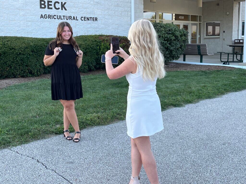 Outside in the lovely late summer weather, students volunteered to assume the role of photographer to capture candid pictures of their classmates sporting their new hardware.