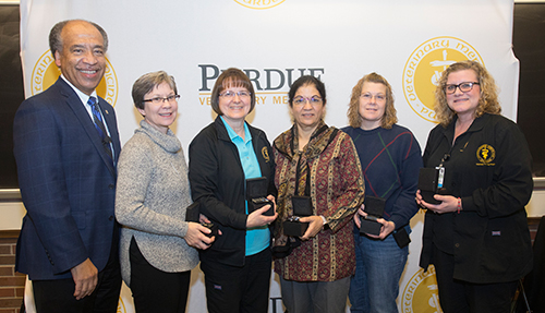 Dean Willie Reed recognizes PVM staff members who completed 20 years of service to Purdue University: (left-right) Debra Branham (VTH), Carol Caldwell (VTH), Margaret Gehlhausen (ADDL), Lisa Holeman (CPB) and Stephanie Stillwell (VTH). (Not pictured: Renu Bajaj, ADDL).